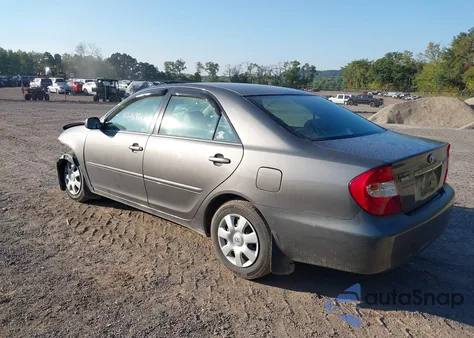 2002 Toyota Camry Le z USA, uszkodzony, nr VIN 4T1BE32K32U580541